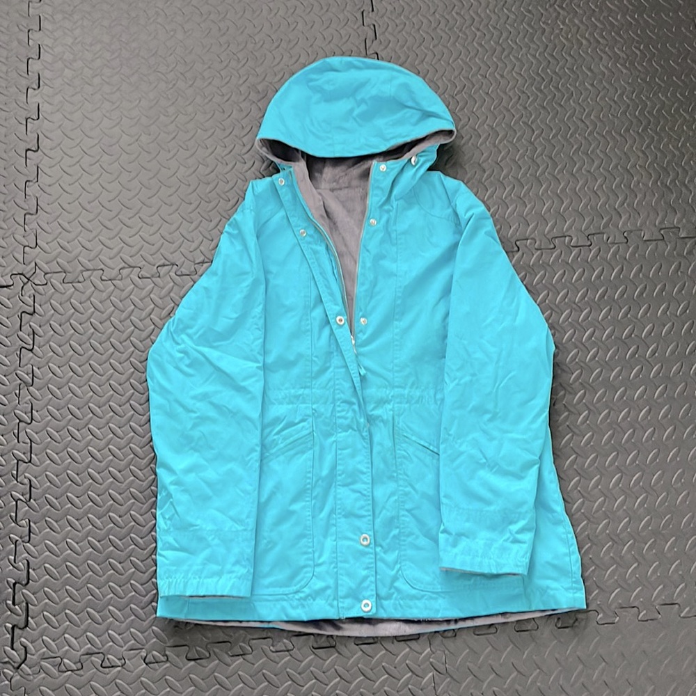 Reversible teal and grey coat